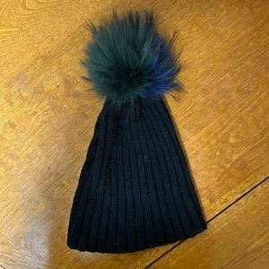 Blue and green fur pop black winter hat
